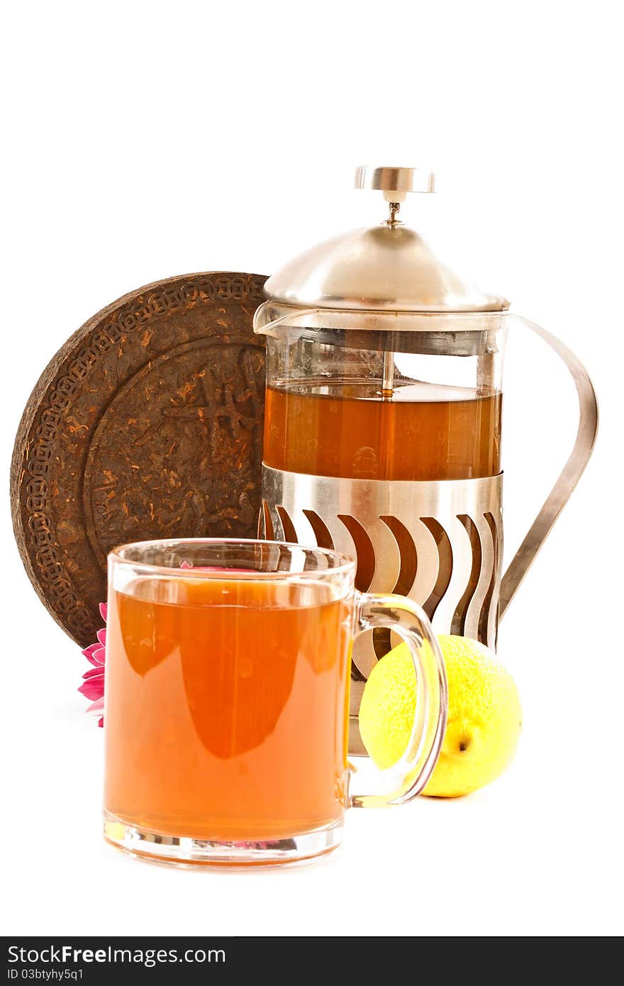 Dry Pressed Pu-erh tea is isolated on a white background