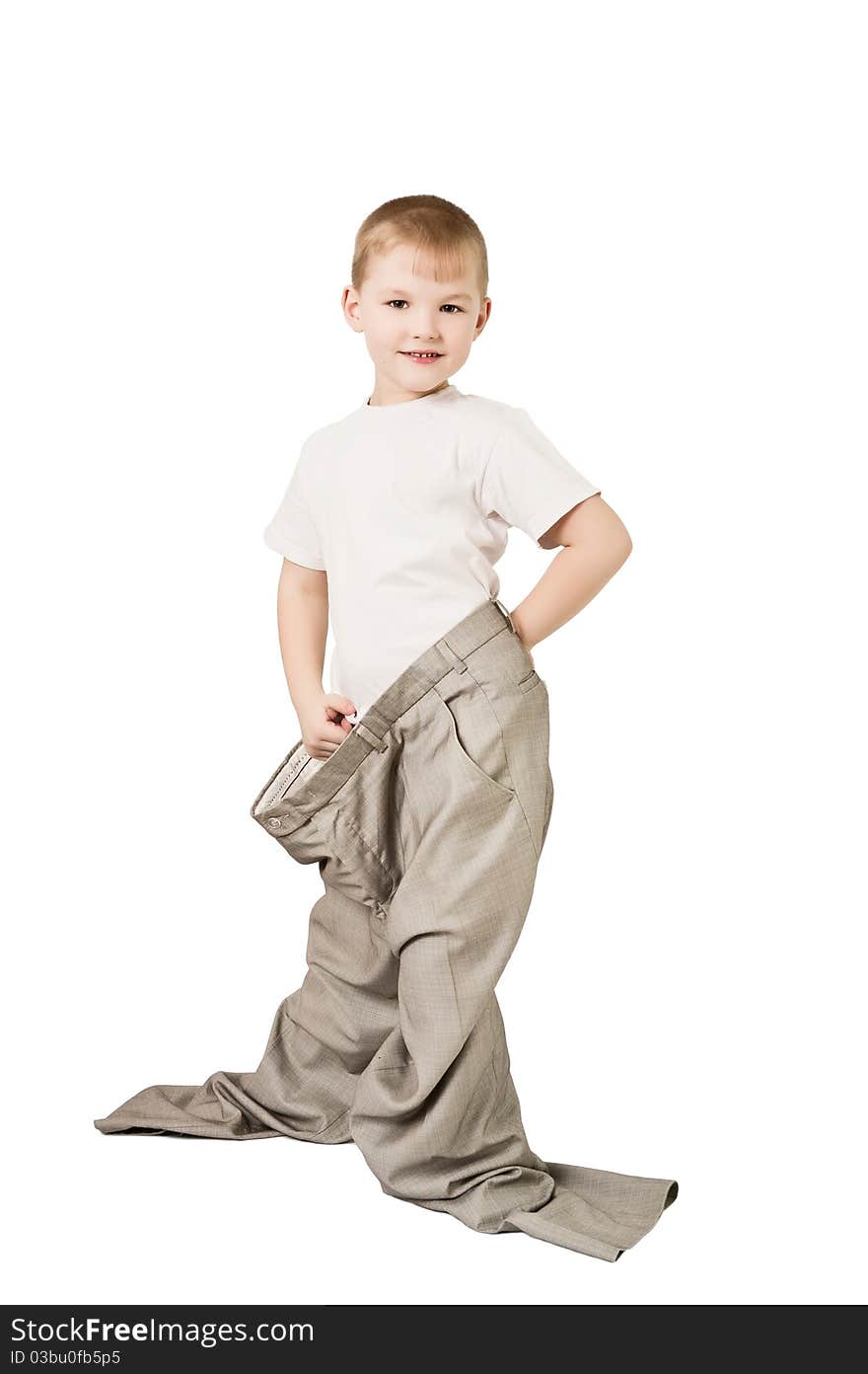 This photograph shows a boy in father's trousers