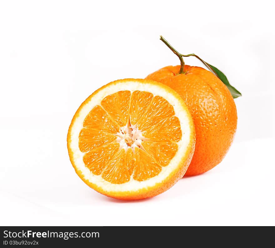 One oranges and half juicy half oranges