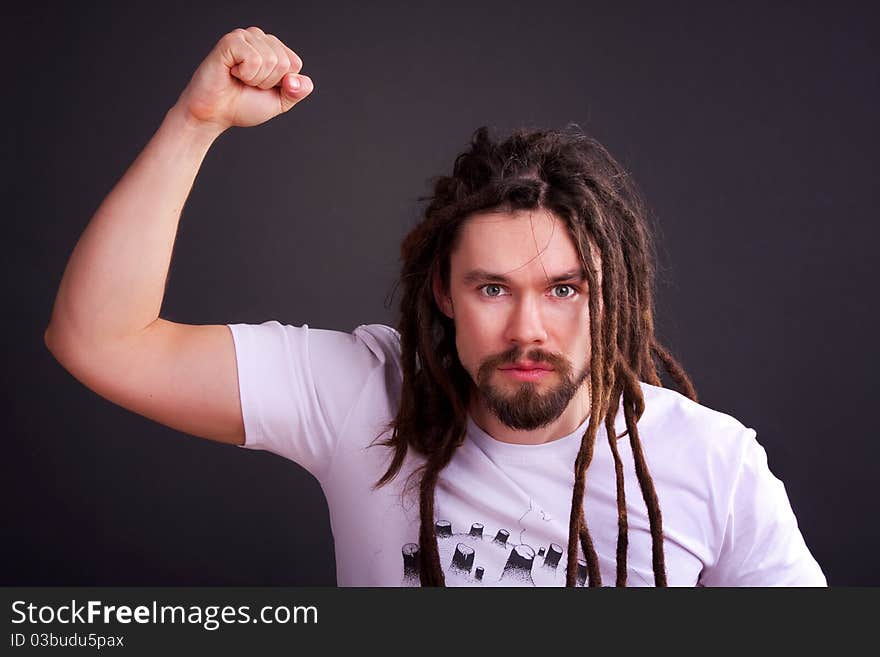 Gay guy with long dreadlocks Posing