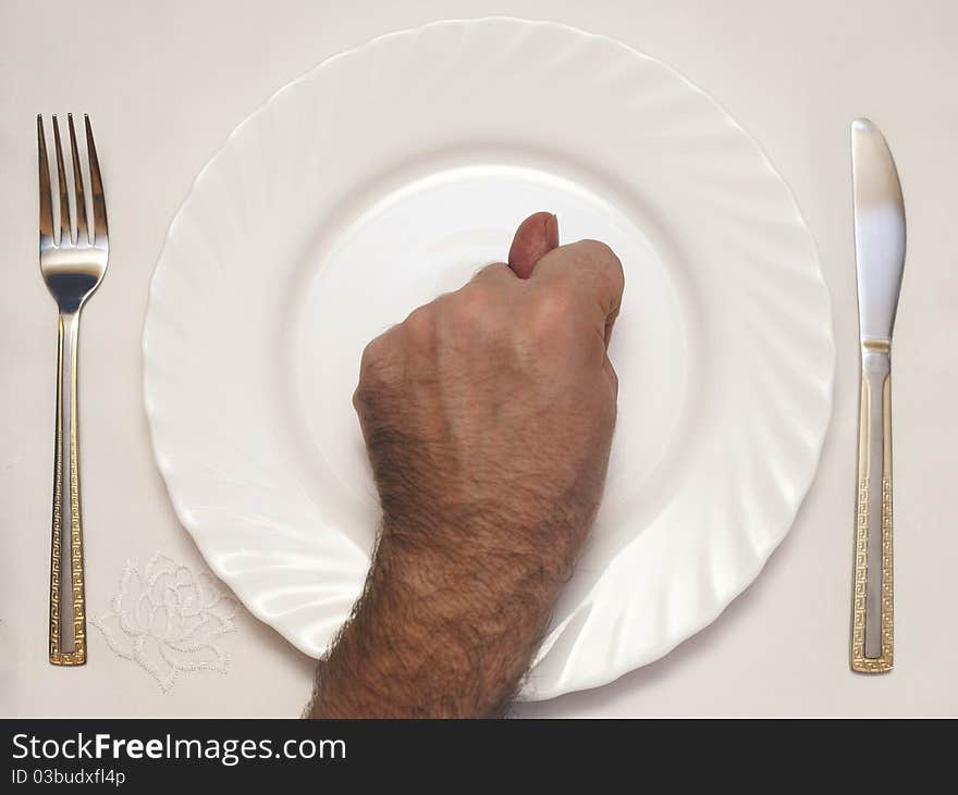 Fig photo on a white plate, the fork and a knife nearby lie. Fig photo on a white plate, the fork and a knife nearby lie