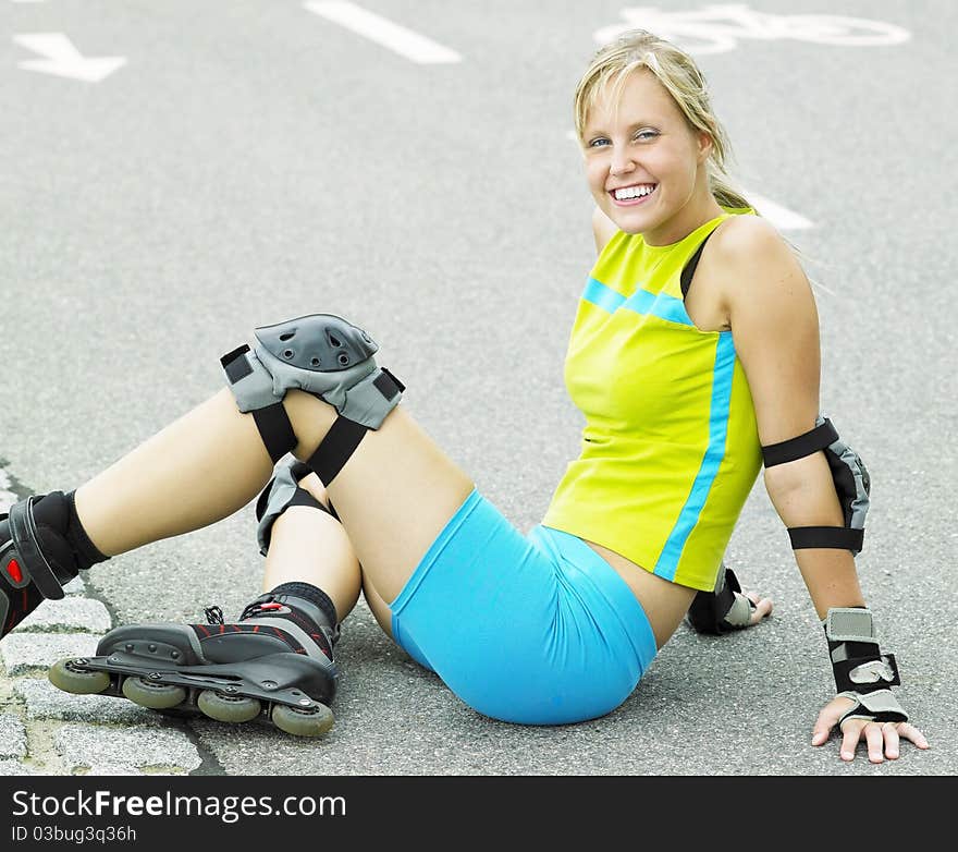 Young woman as inline skater