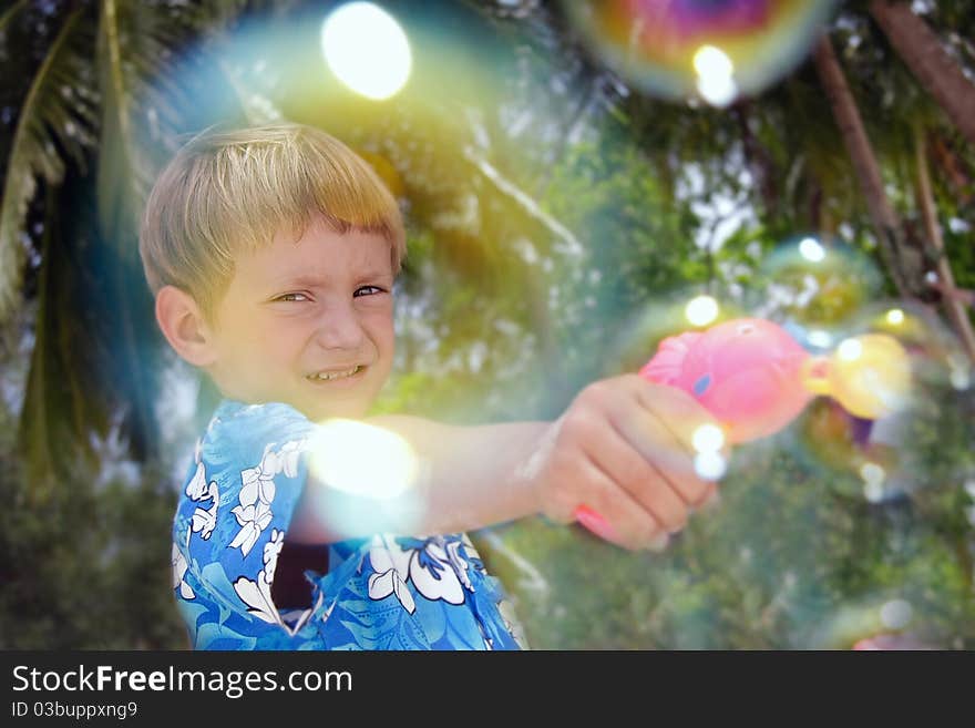 Boy Playing With Bubbles