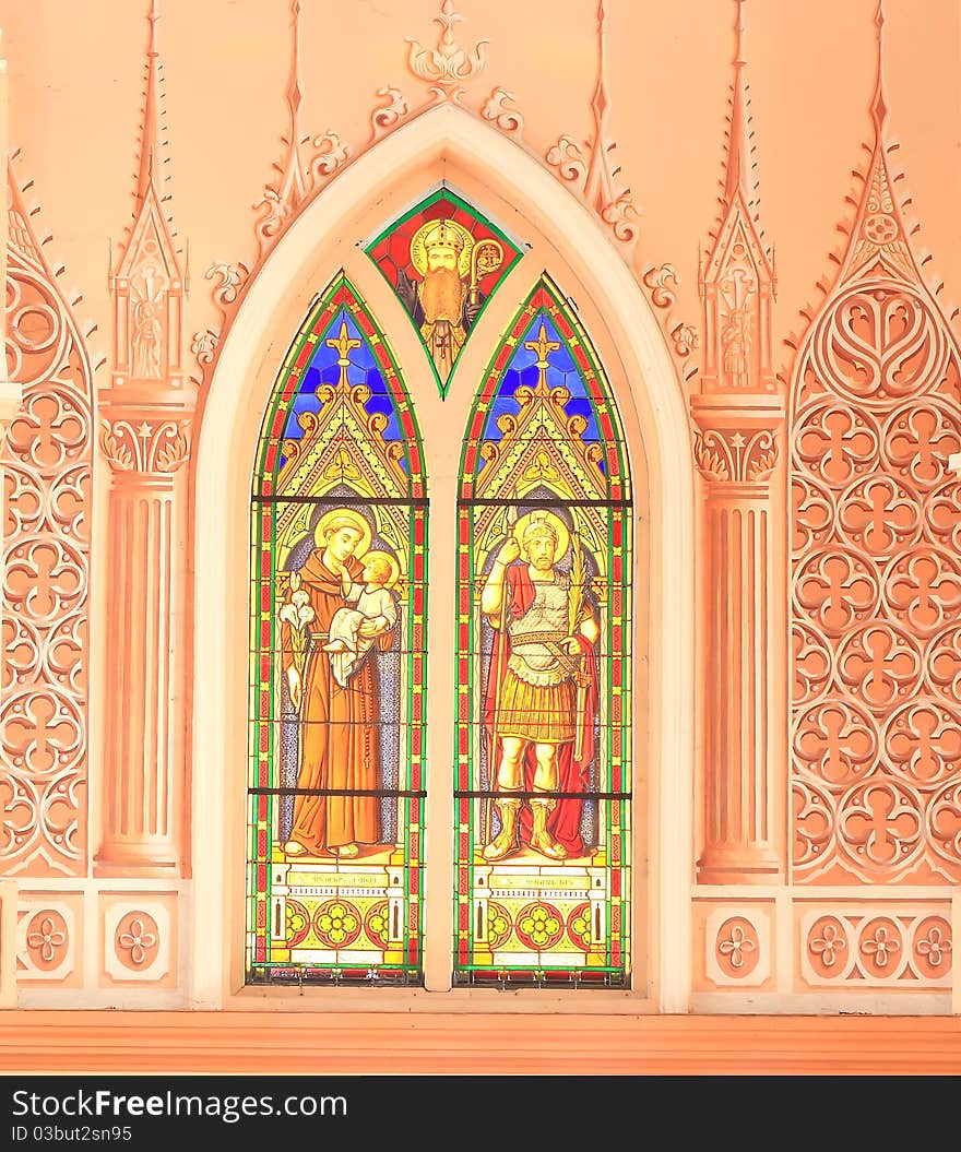 Old style painted glass in gothic church, east of Thailand. Old style painted glass in gothic church, east of Thailand