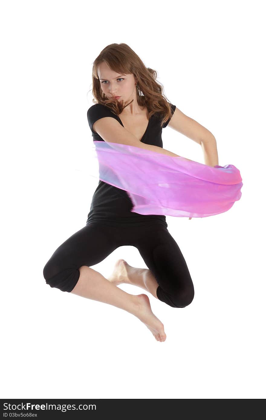 Young beautiful woman jumping on an isolated white background. Young beautiful woman jumping on an isolated white background