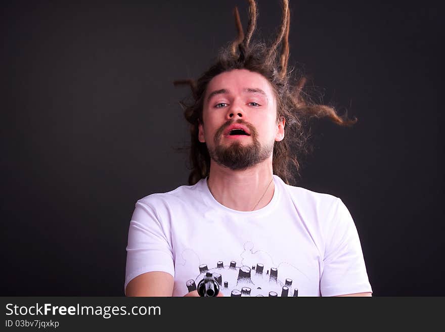 Gay guy with long dreadlocks Posing