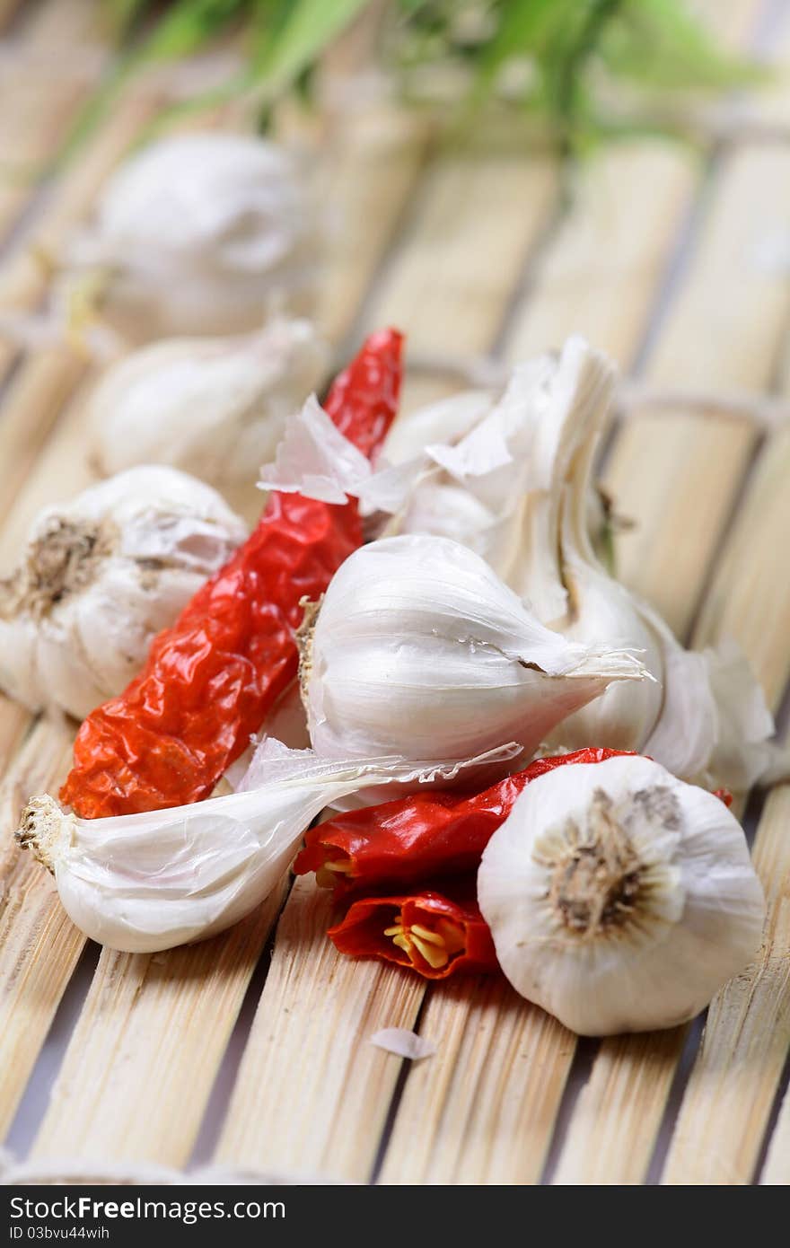 Closeup shot of red chillies and garlic.