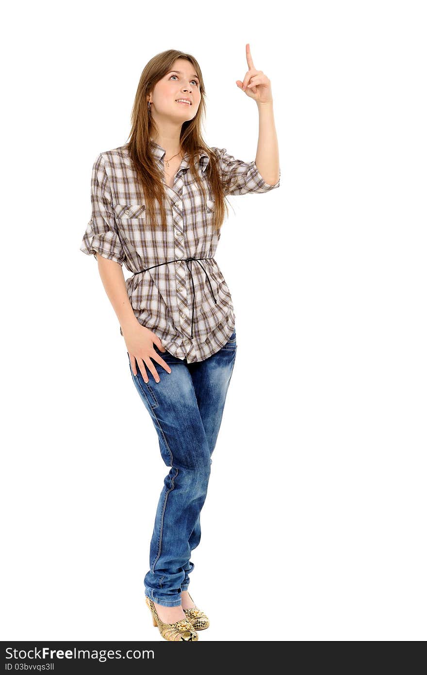 Young woman showing on something by a finger - isolated on a white background