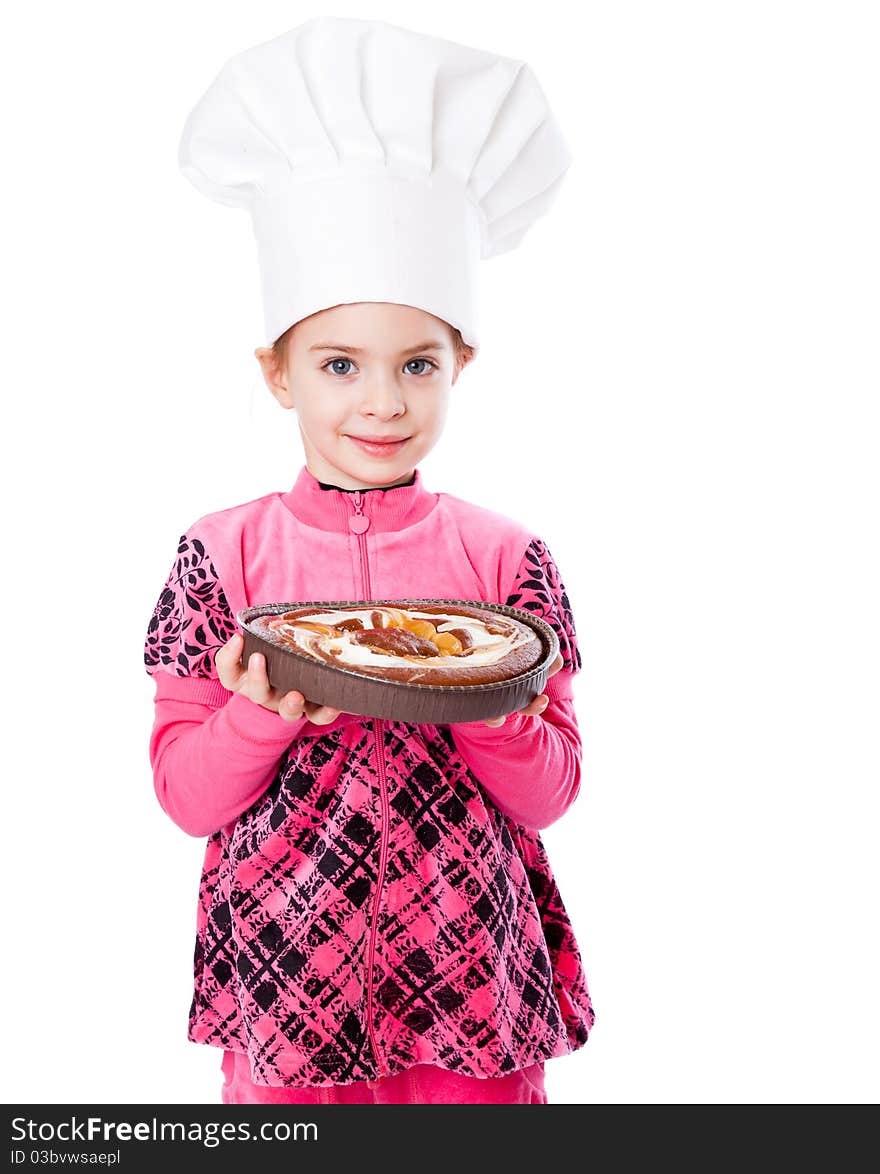 A little girl is holding a plate of pie. Isolated on a white background