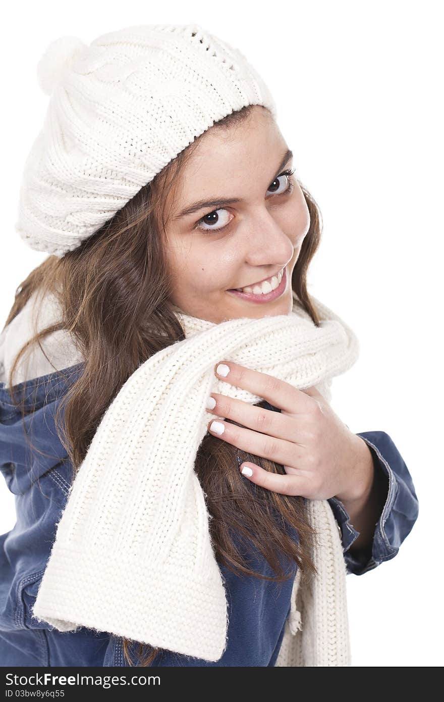 Woman with a scarf and a hat smiling