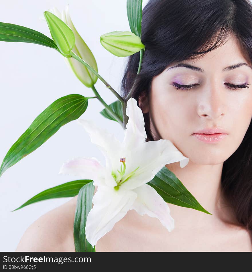 Beautiful woman with lily