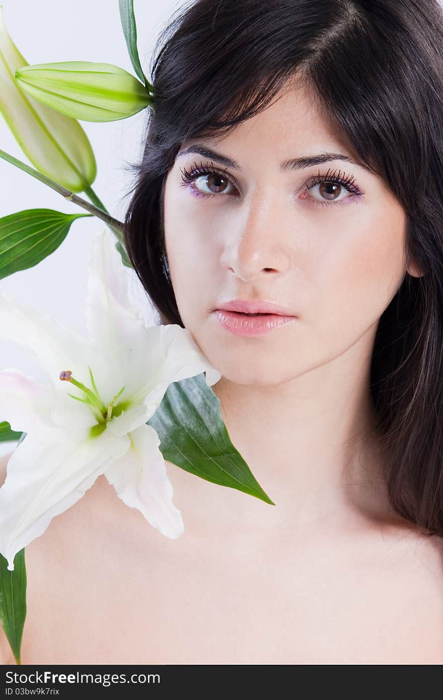 Beautiful woman with lily