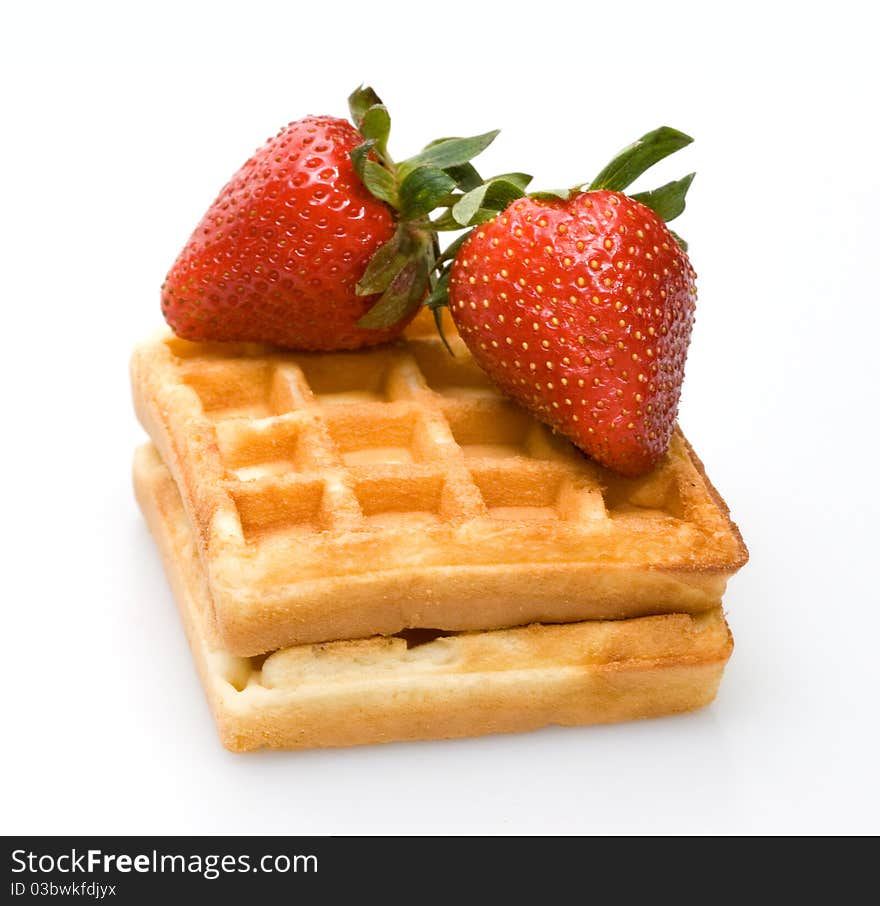 Waffles and strawberry isolated on white. Waffles and strawberry isolated on white