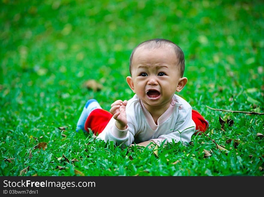 Baby boy is crying after feeding time. Baby boy is crying after feeding time