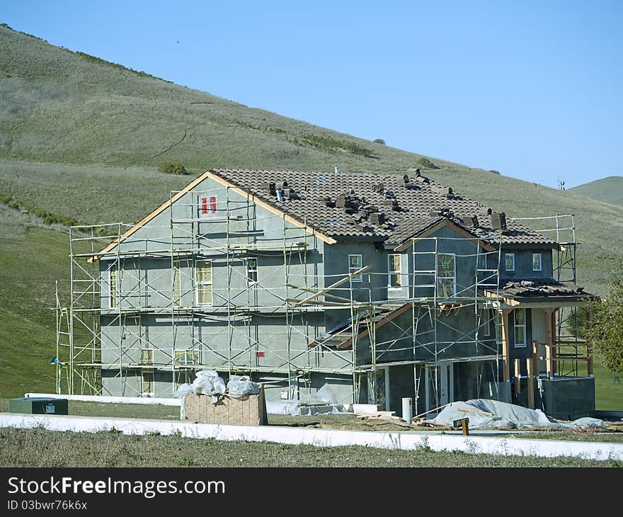 House under construction near open space