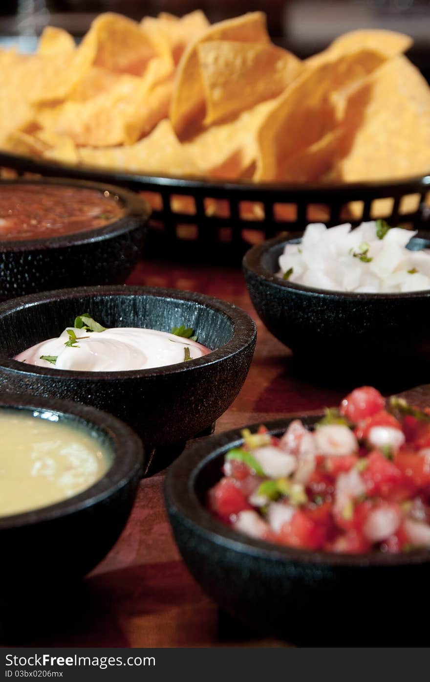 Tortilla chips with a variety of fresh salsas. Tortilla chips with a variety of fresh salsas