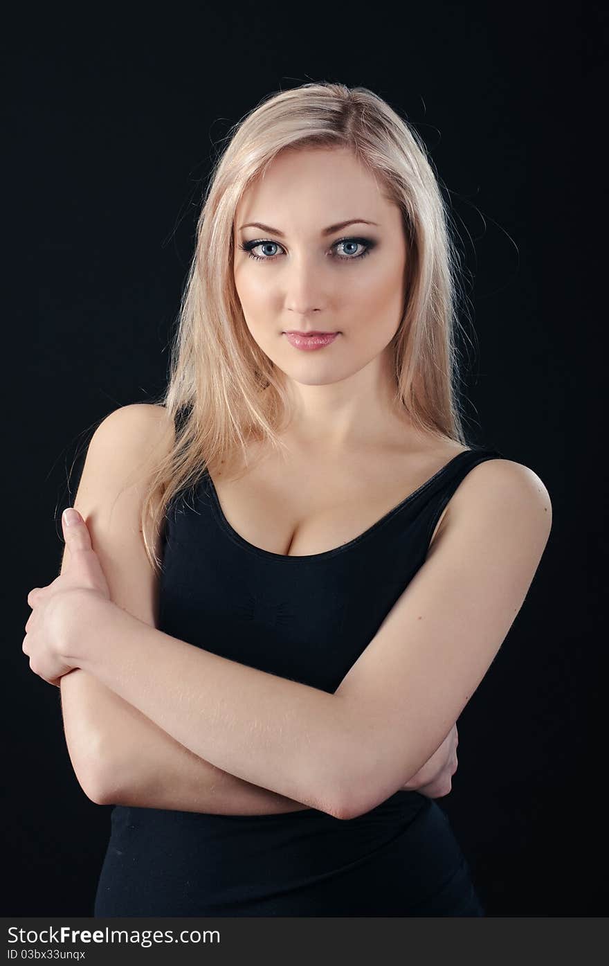 Portrait of beauty blonde girl on black background. Portrait of beauty blonde girl on black background