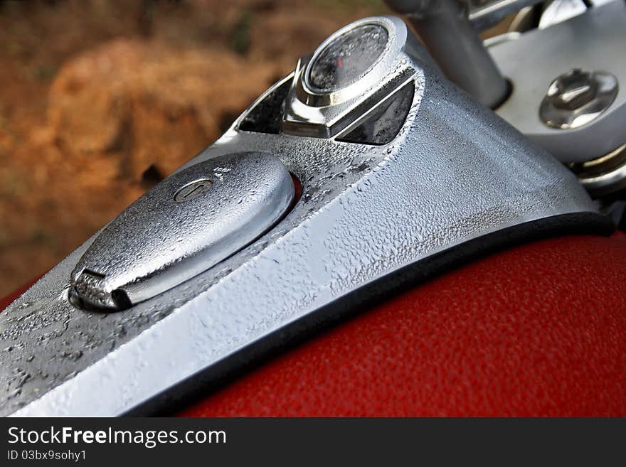 Morning Dew On Chrome And Red Metal