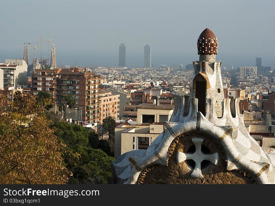 Park Guell, Montana Pelada, Barcelona, Spain - close-up view with the city in the background. Park Guell, Montana Pelada, Barcelona, Spain - close-up view with the city in the background