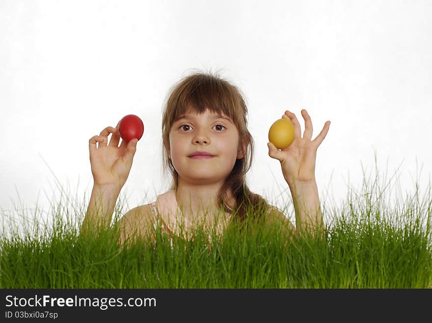 Girl with painted eggs