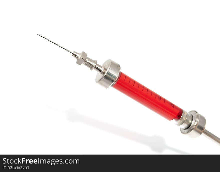 Syringe on a white background