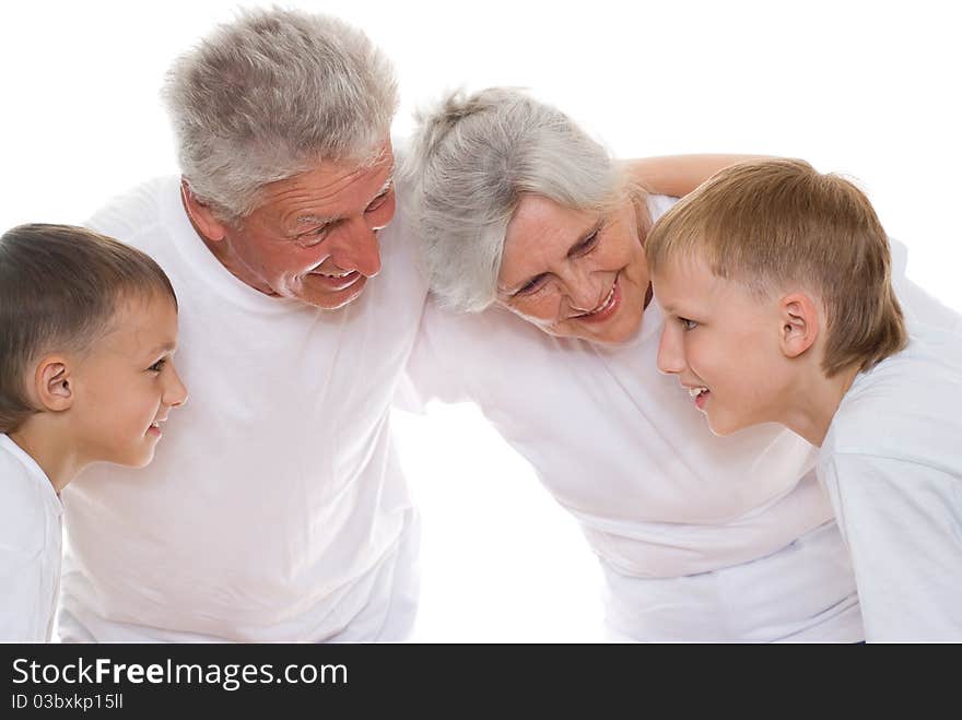 Family of four on a white background