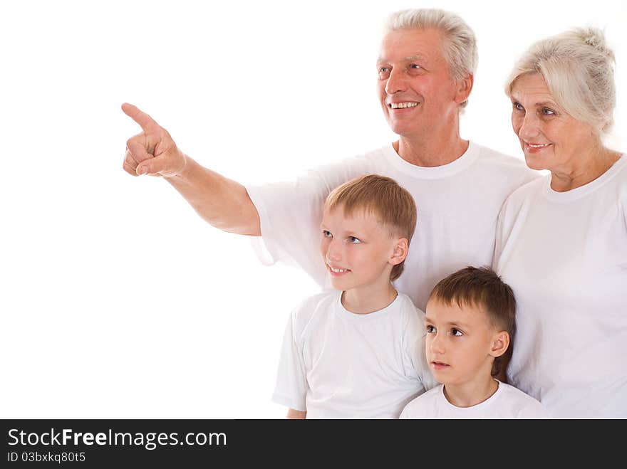 Family of four together on a white background