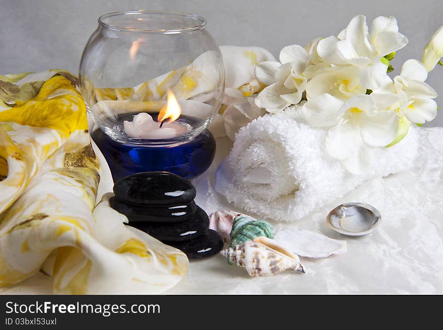 Rocks, flowers, fans and towels on white background. Rocks, flowers, fans and towels on white background