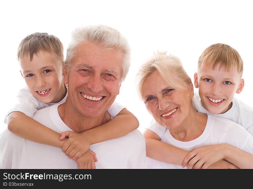 Family of four on a white background