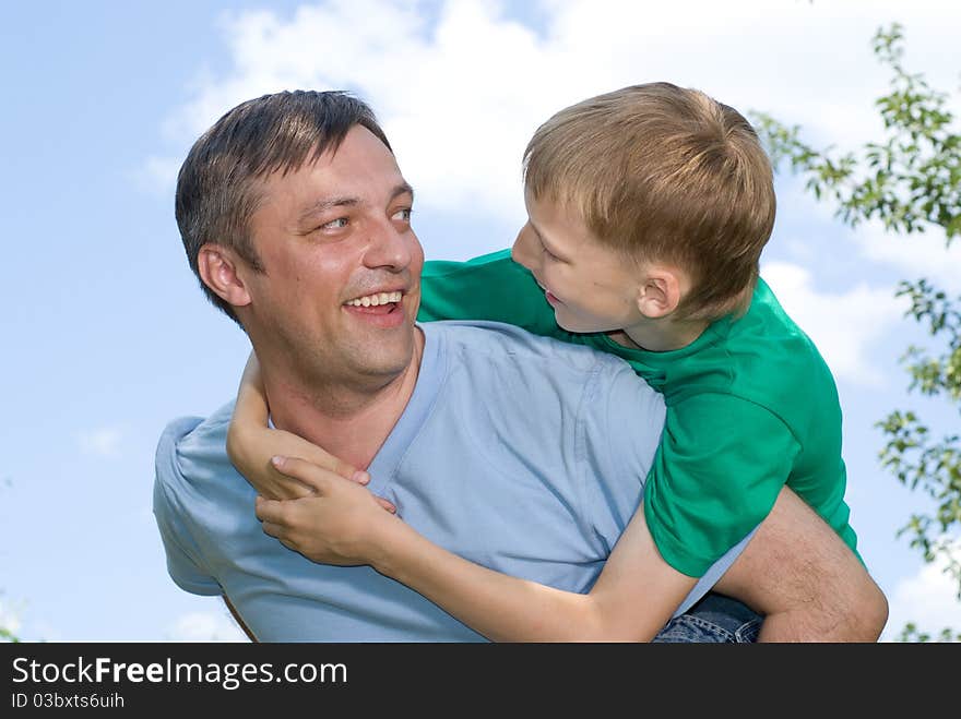 Father with his son in a park