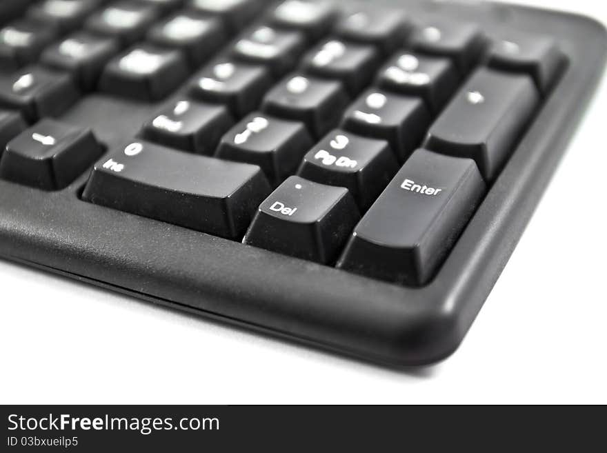 Keyboard close up with the enter button in focus ready for toning