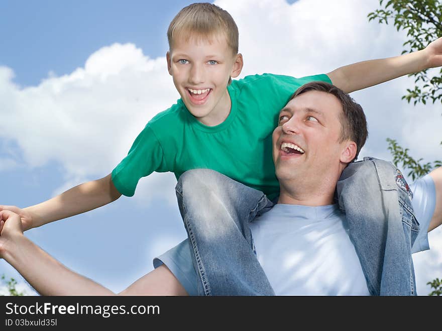 Father with his son in a park