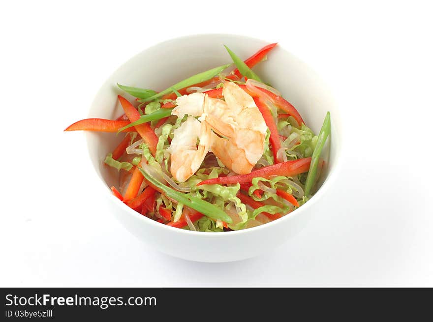 Salad with seafood close up on a white background