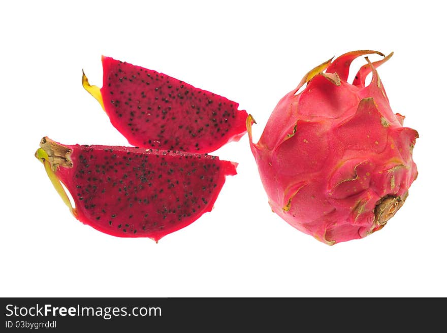 Red Dragon Fruit With Two Slices Showing The Small Black Seeds