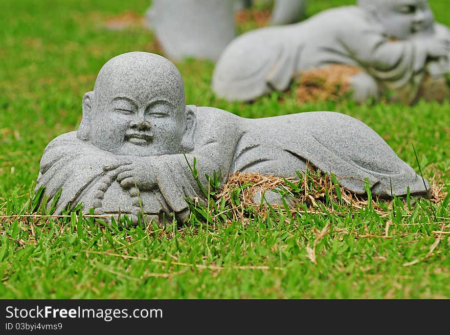 Young Buddha Statue In A Lying Pose