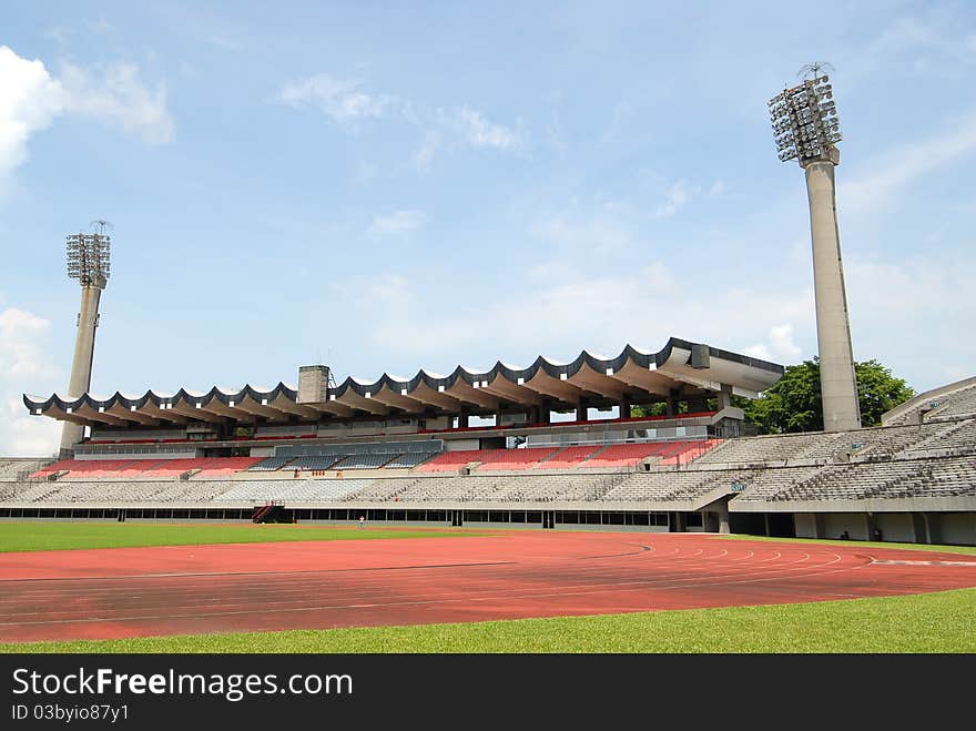 Small Sport Stadium With View Of Grandstand And Floodlights