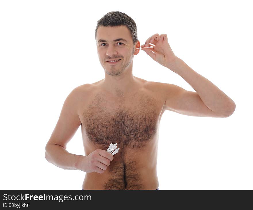 Handsome young man cleaning ears with cotton pad stick. isolated on white background. Handsome young man cleaning ears with cotton pad stick. isolated on white background