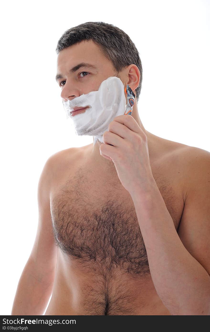 Young handsome male shaving face beard . isolated on white background