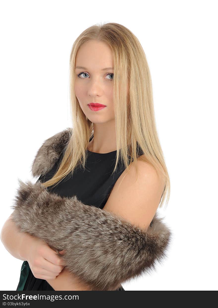 Beautiful woman in elegant animal fur jacket.