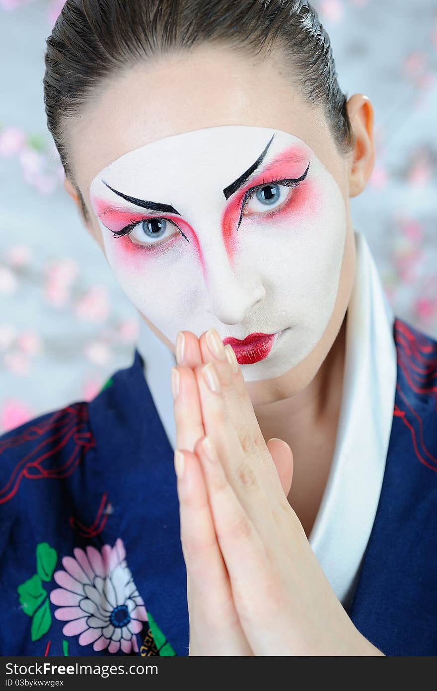 Japan geisha woman with creative make-up.close-up artistic portrait