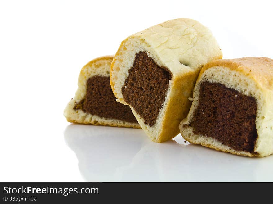 Chocolate stuffed bun on white background. Chocolate stuffed bun on white background