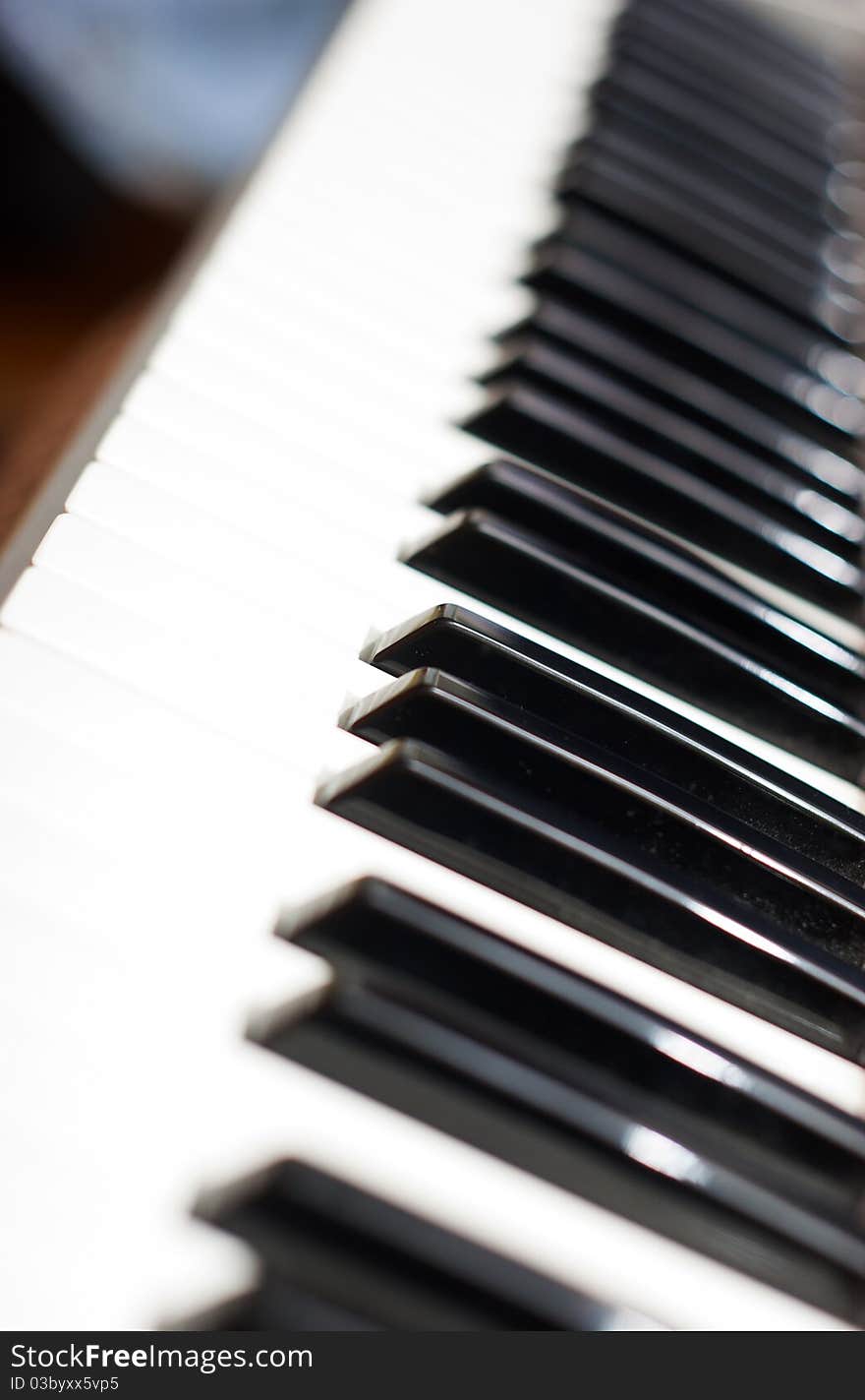 Men playing keyboard close up. Men playing keyboard close up