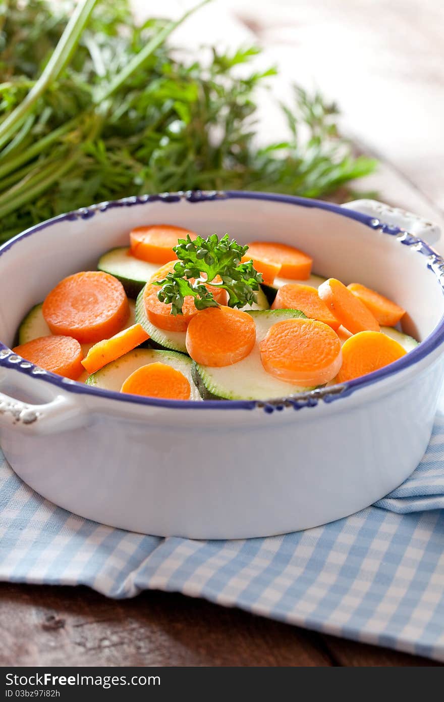 Sliced carrots and zucchini in a bowl