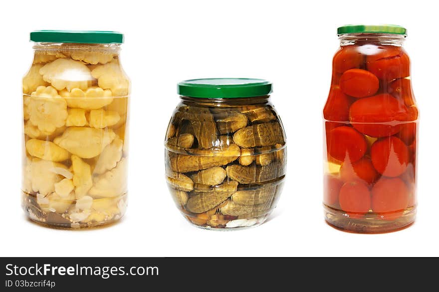 Three jars of pickled vegetables