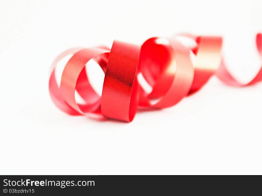 Red ribbon isolated on white background