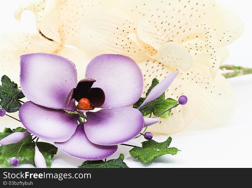 Multicolored flower decoration isolated on white background