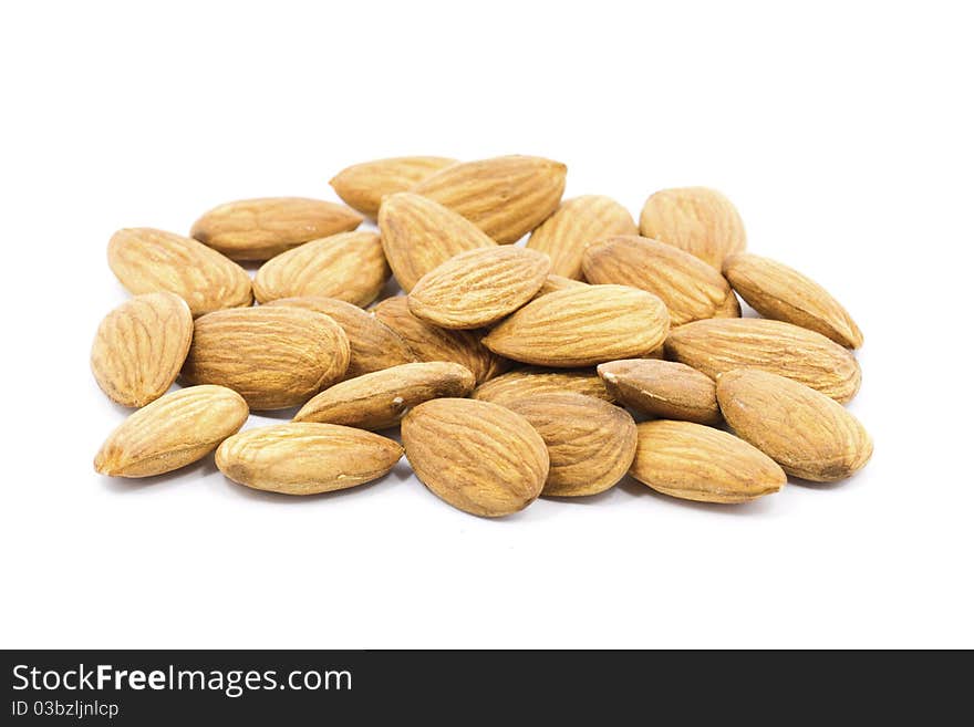 Group of almonds isolated on white background