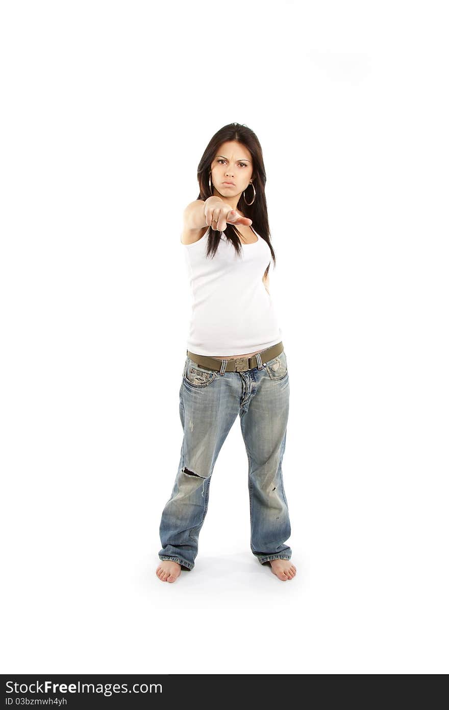 Young female pointing at you - Portrait of an attractive young woman pointing her finger. Isolated on white background. Young female pointing at you - Portrait of an attractive young woman pointing her finger. Isolated on white background