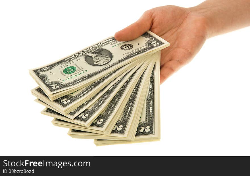 A womans hand demonstrating a pile of two-dollar banknotes. A womans hand demonstrating a pile of two-dollar banknotes