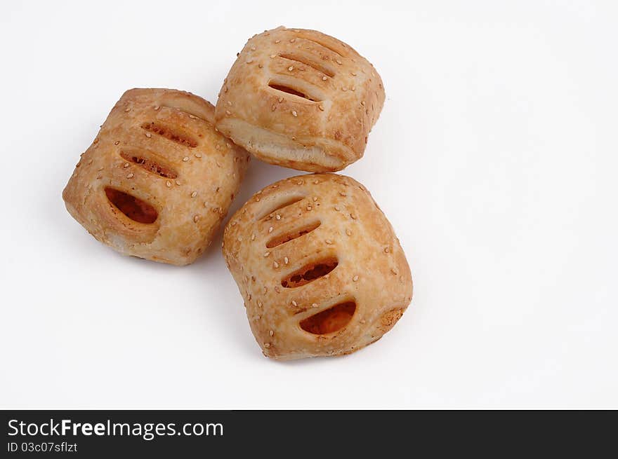 Baked puff pastry on a white background